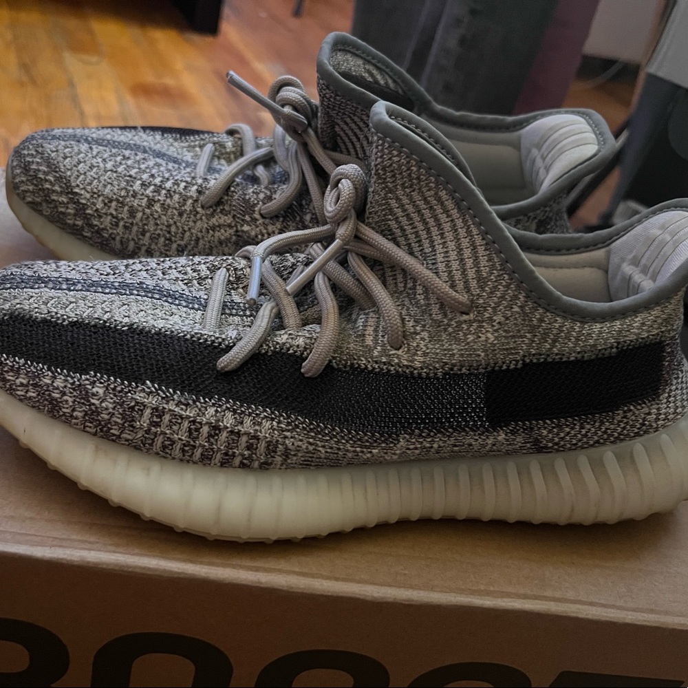 yeezys only worn a few times and they have a small tear